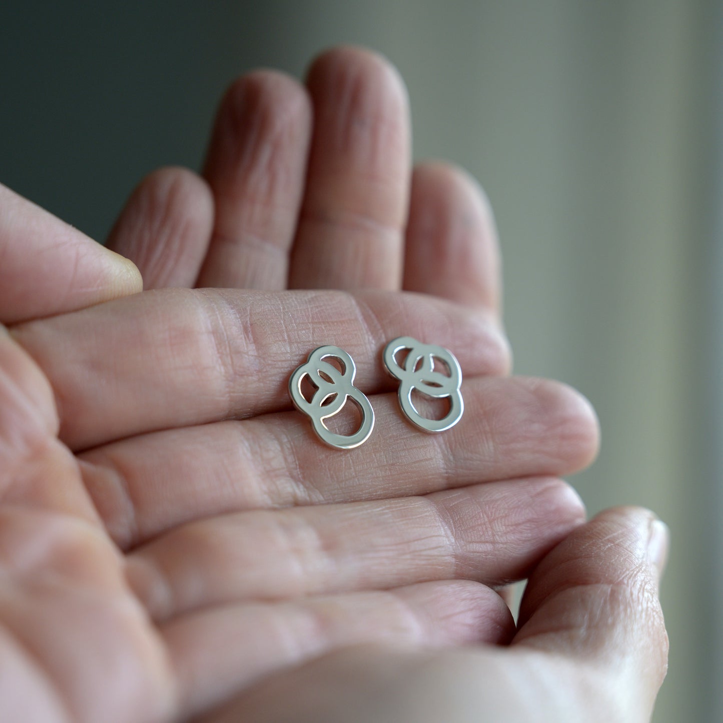 Revolution Silver Studs - open design