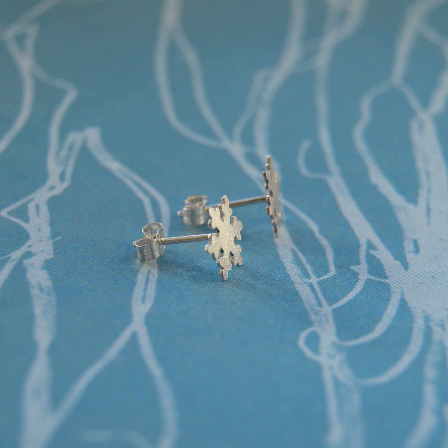 Intricate Silver Snowflake Studs