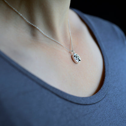 Silver & Black Onyx Coin Pendant