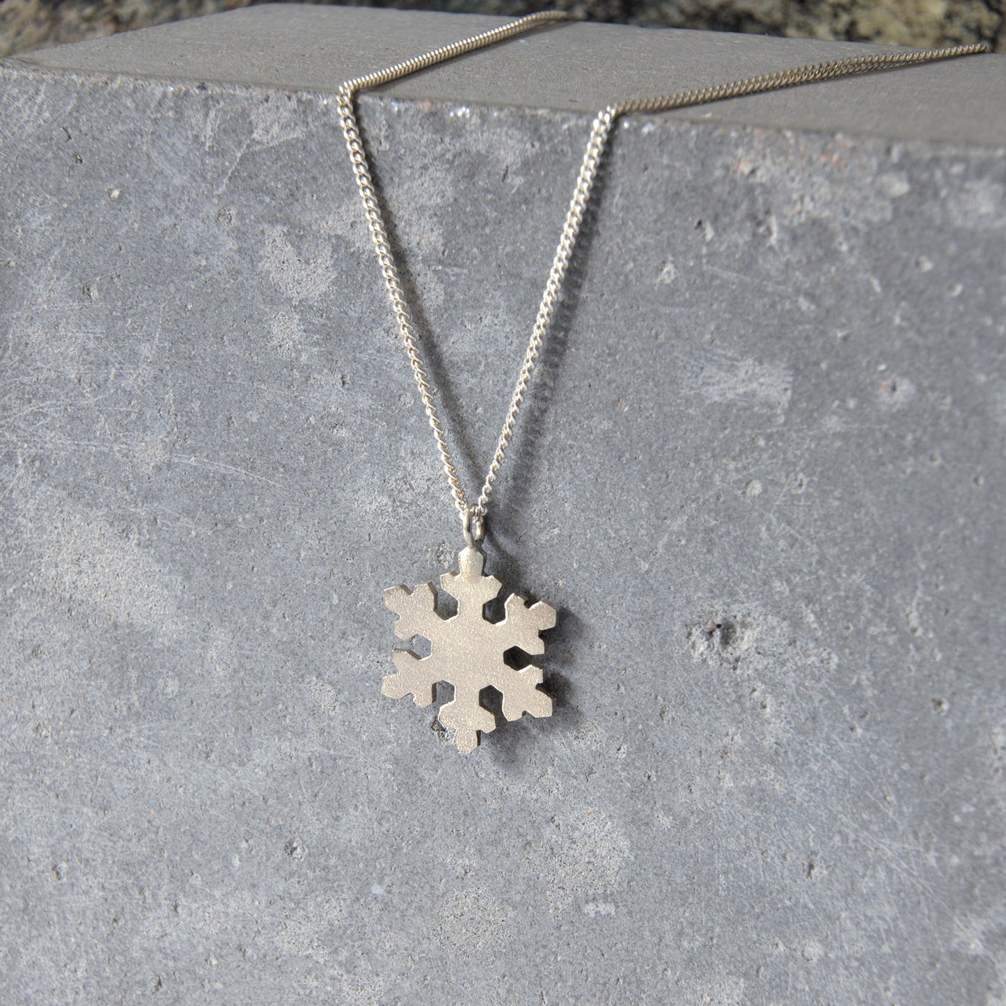 Intricate Silver Snowflake Pendant