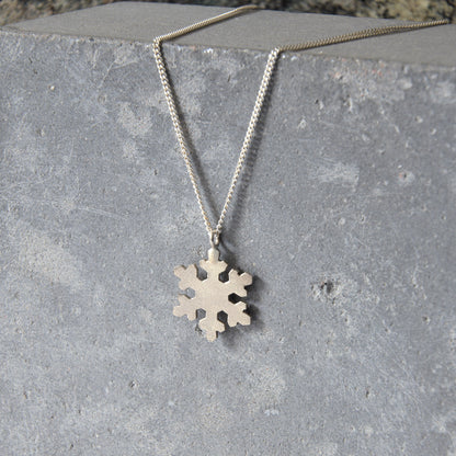 Intricate Silver Snowflake Pendant
