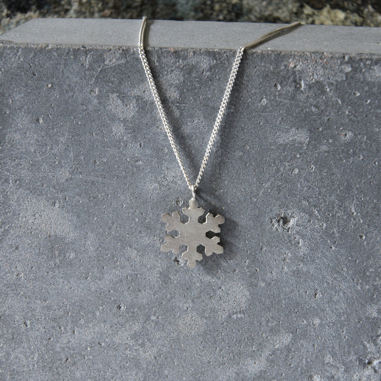 Intricate Silver Snowflake Pendant