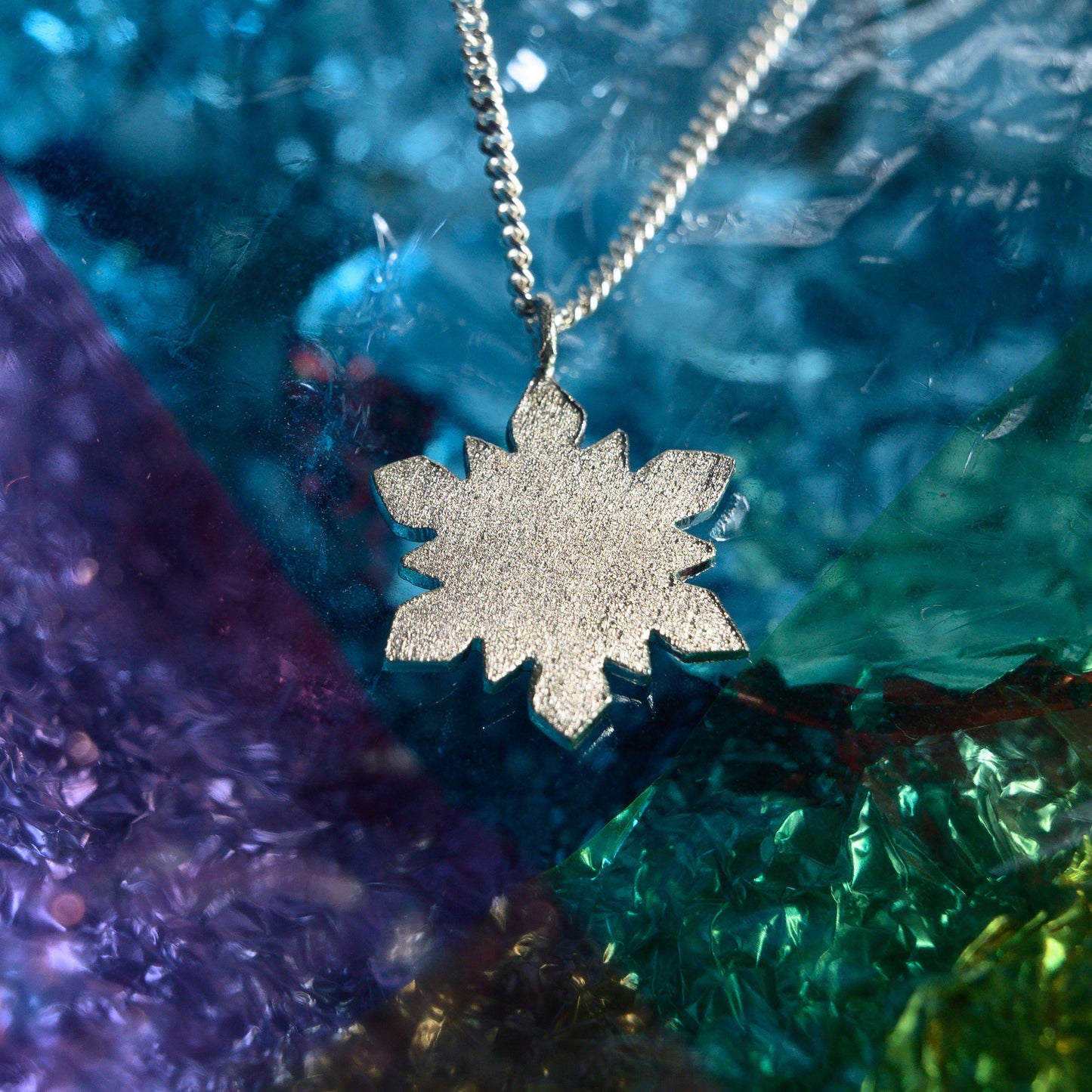 Delicate Silver Snowflake Pendant