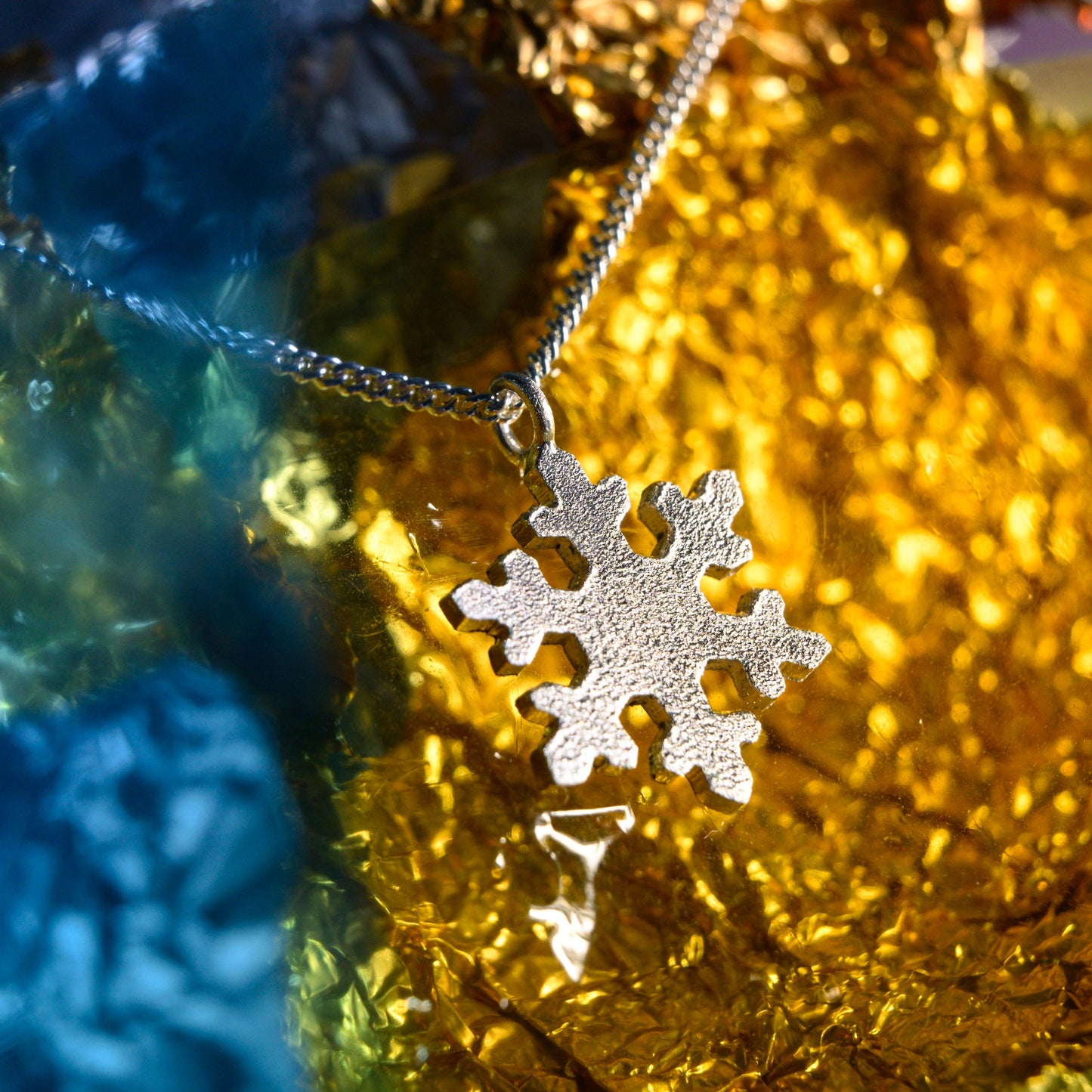 Intricate Silver Snowflake Pendant
