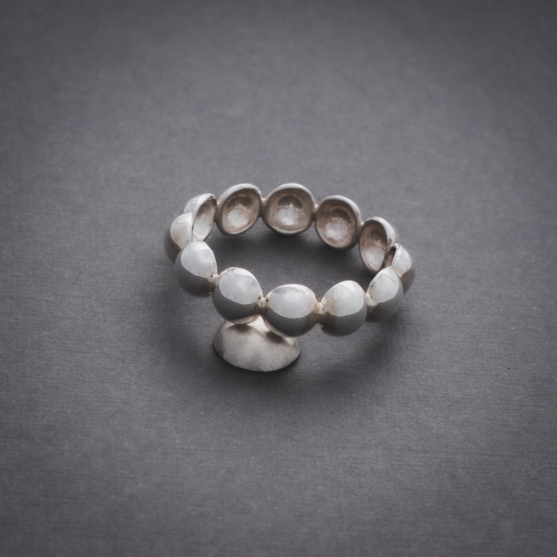Product shot of silver domes ring